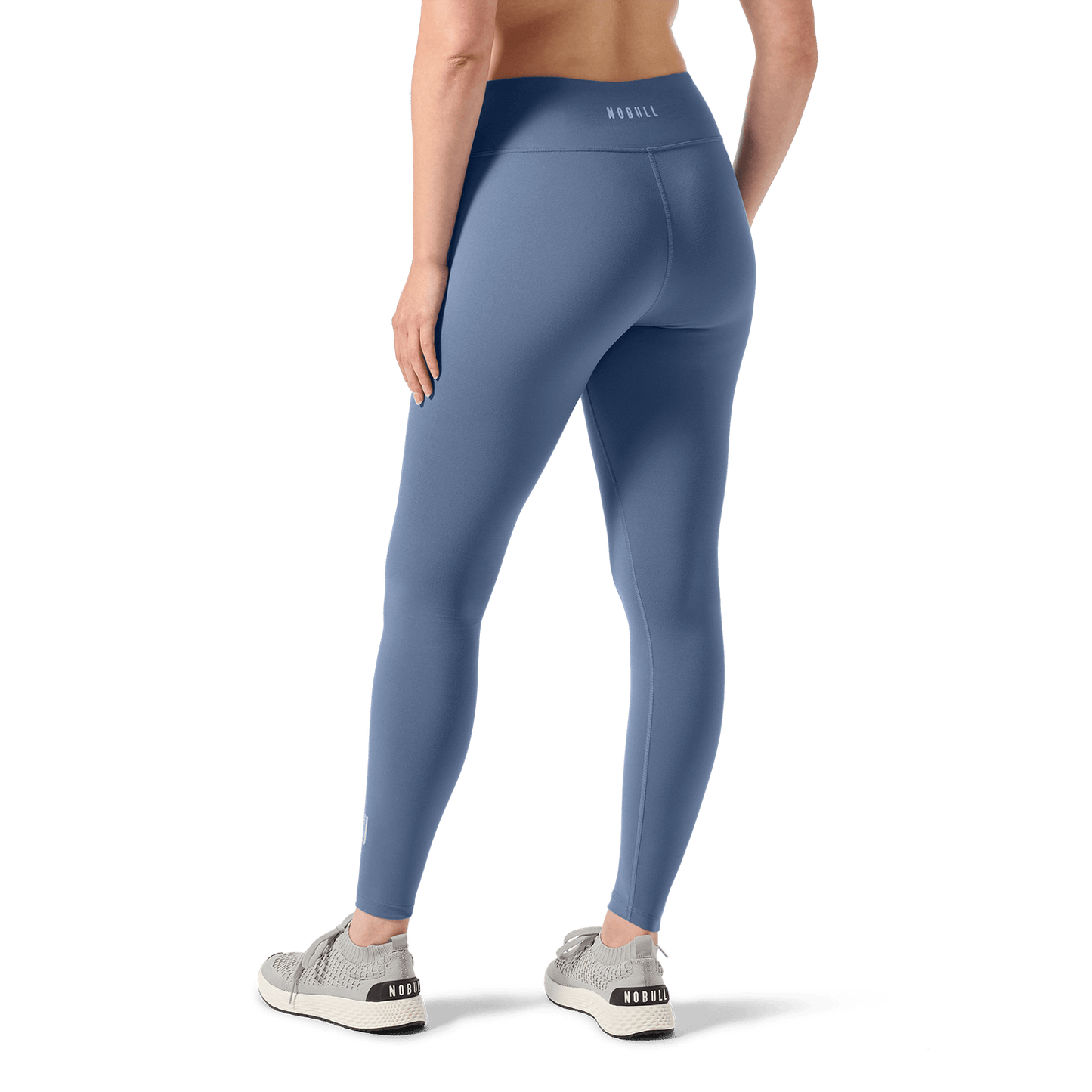 Women's Dusty Blue U High-Rise Matte Tight 28" Back Lower Body Angle.
