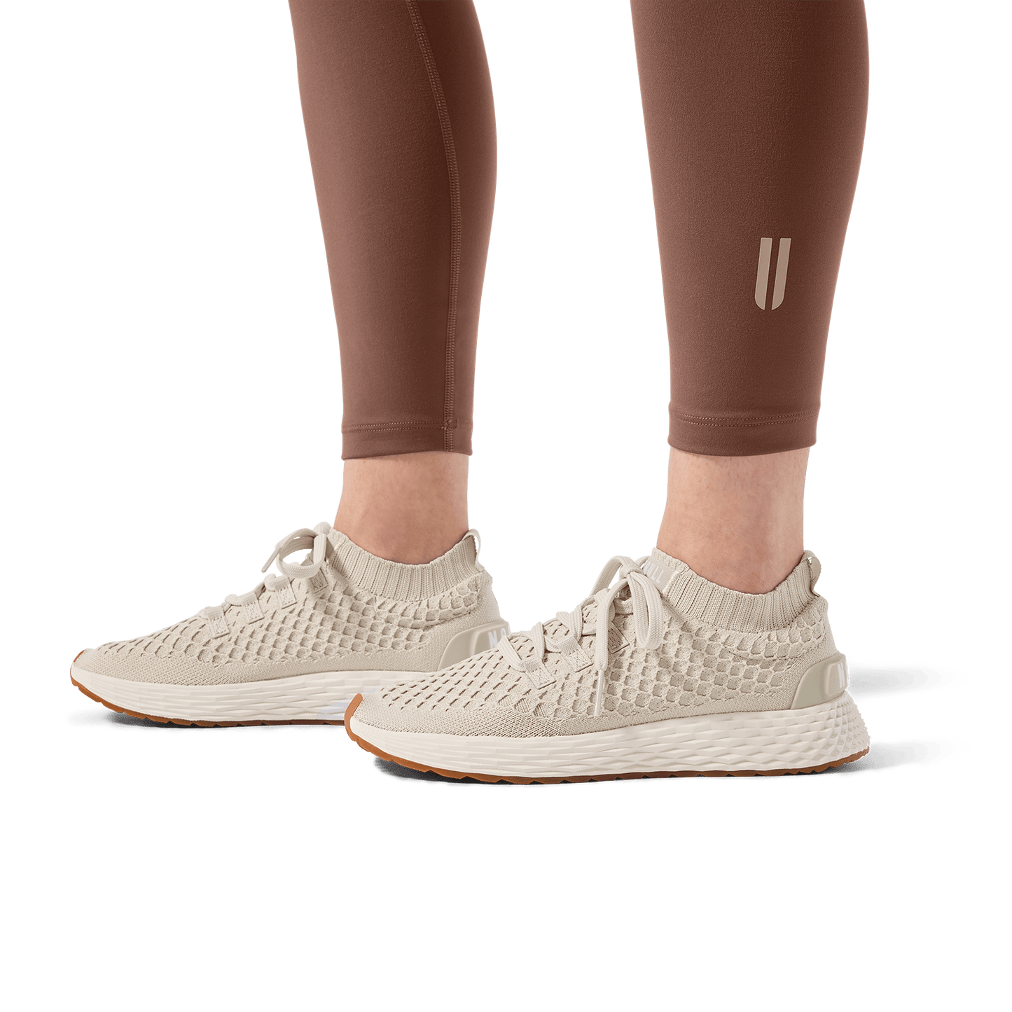 Women's Acorn U High-Rise Matte Tight 28" Footwear Angle.