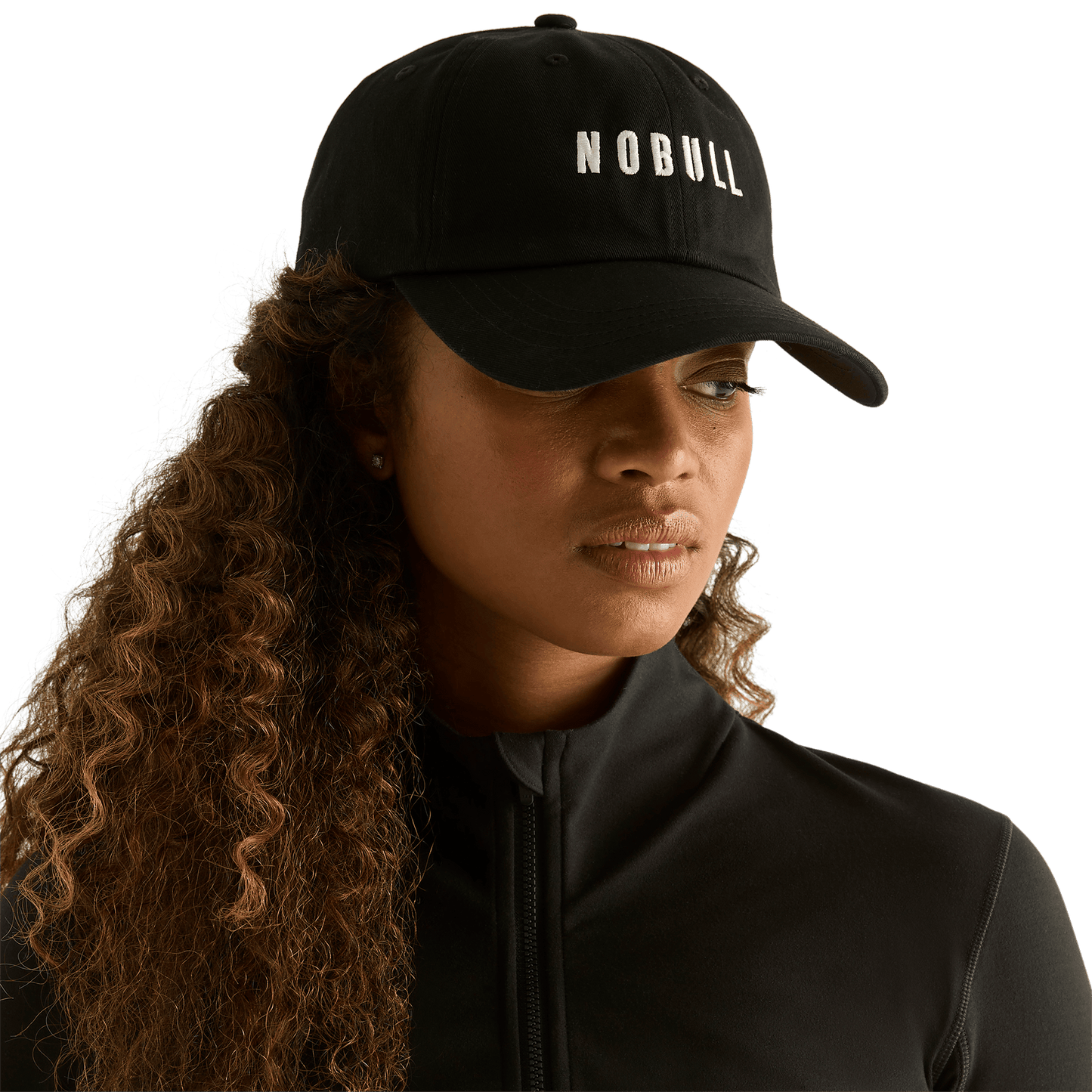 Woman wearing black NOBULL hat - front facing