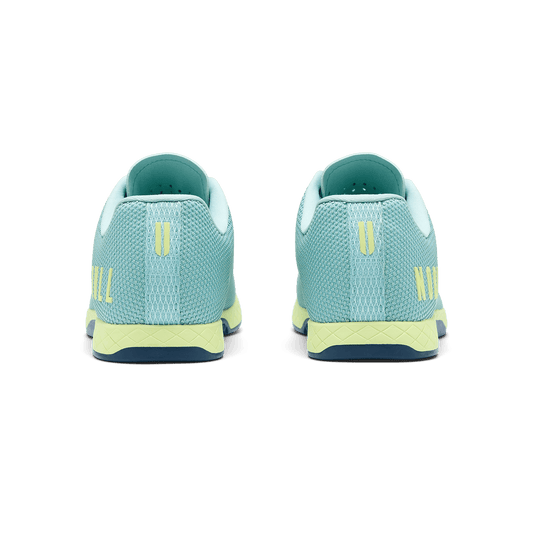 Blue Haze Pear Outwork Shoe Back Angle.