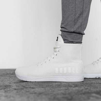 Men's White Outwork High-Top Shoes On Body Angle.