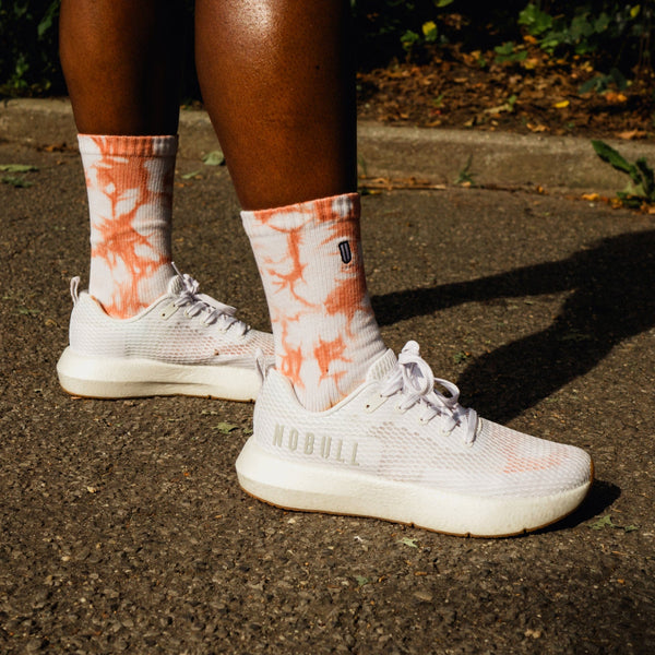 Women's White Drive Mesh Shoe On Body Angle.