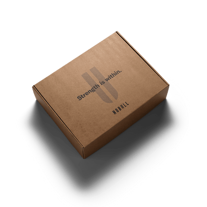 Brown cardboard box with 'Strength is within' text on a white background
