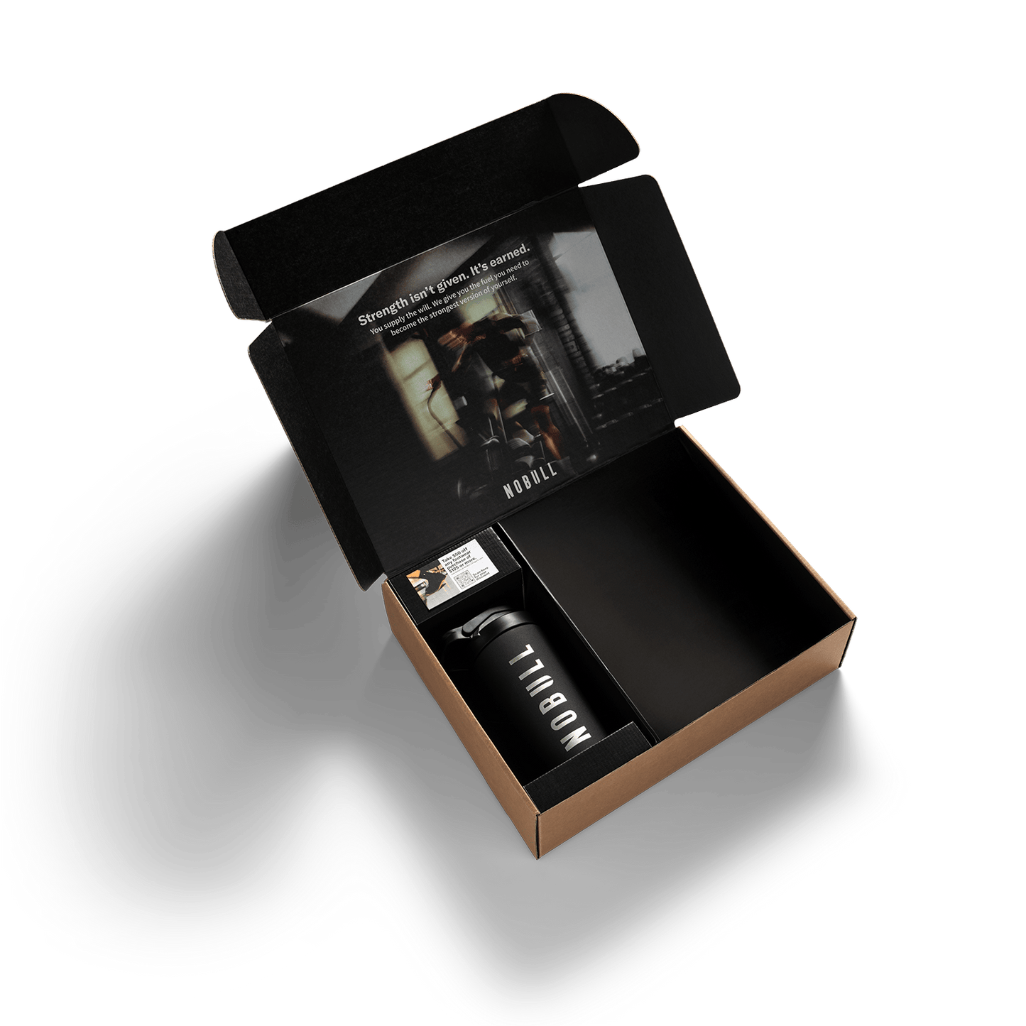 Open black box with a black tumbler and product packaging on a white background