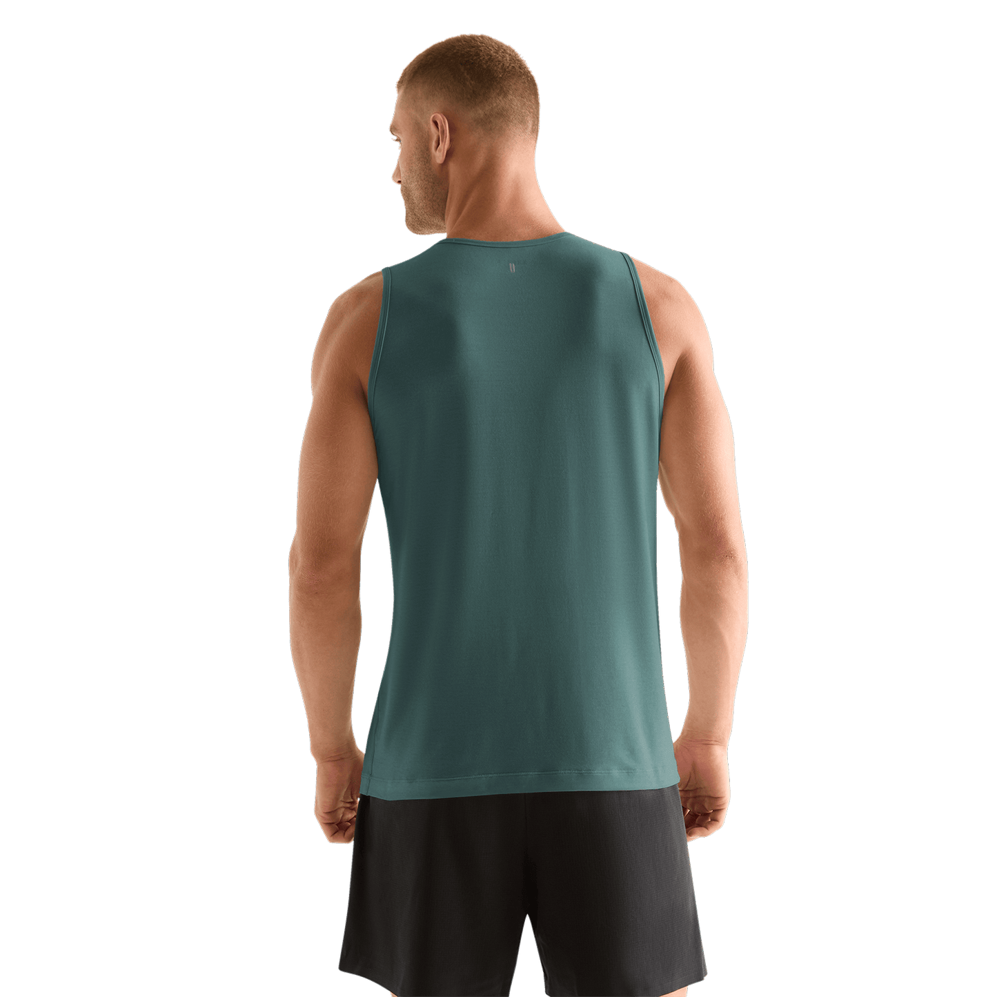 Man wearing silver pine NOBULL tank 
