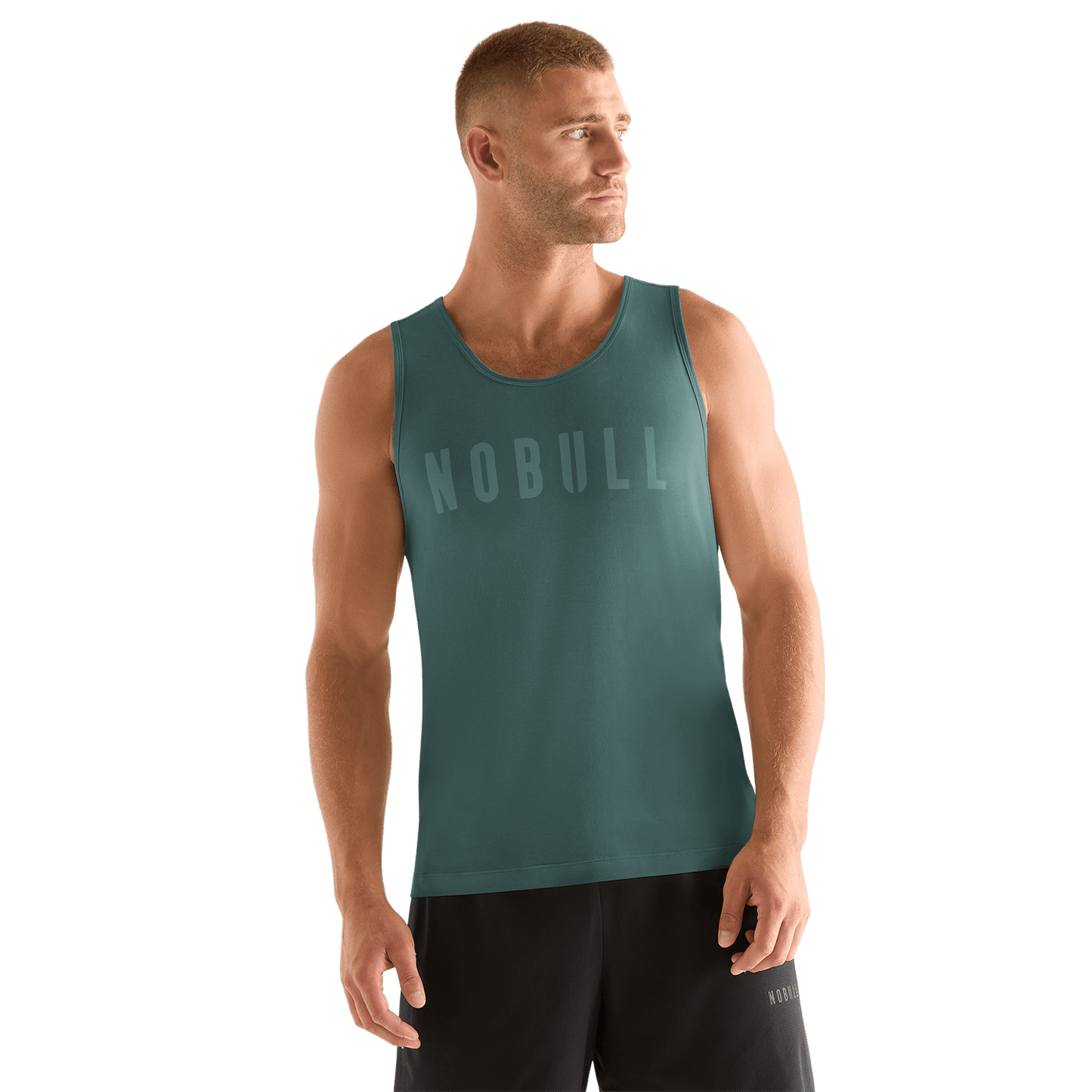 Man wearing silver pine NOBULL tank 