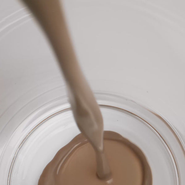 Video of chocolate plant protein shake being poured int a glass