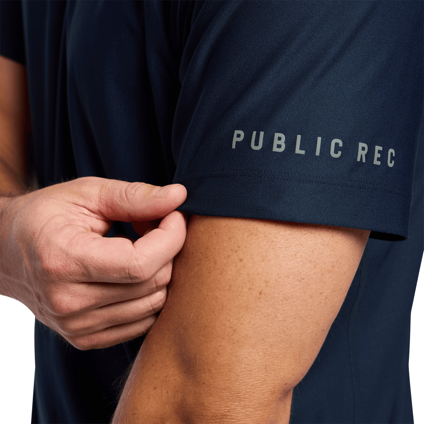 Men's Navy All Fore It Polo Tee Detail Angle.